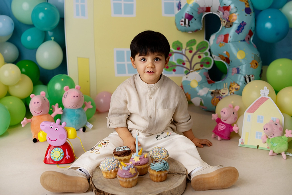 3-year-old boy during a cake smash Petite Session in Enfield, North London