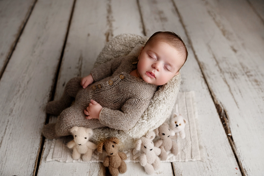 4-week-old baby boy during a newborn photography session in Enfield, North London