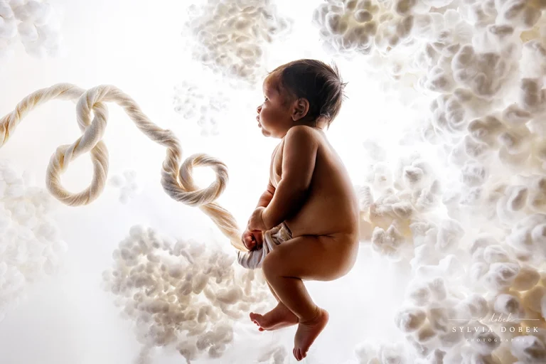 Premature newborn baby during a newborn photography session in Enfield, North London
