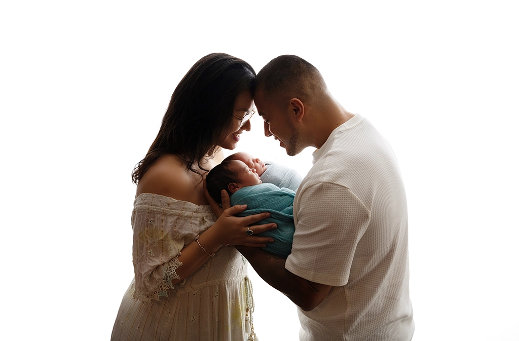 Family wearing neutral outfits during a family photography session in Enfield, North London