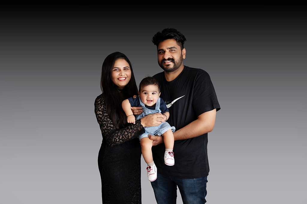 Parents with their baby during an Enfield family portrait session