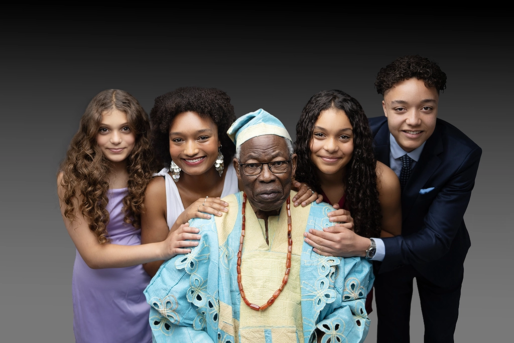Multi-generational family wearing traditional clothing during a family photography session in Enfield, North London