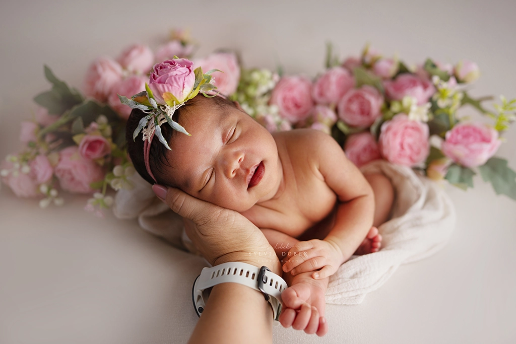 Sleeping newborn baby during a newborn photography session in Enfield, North London