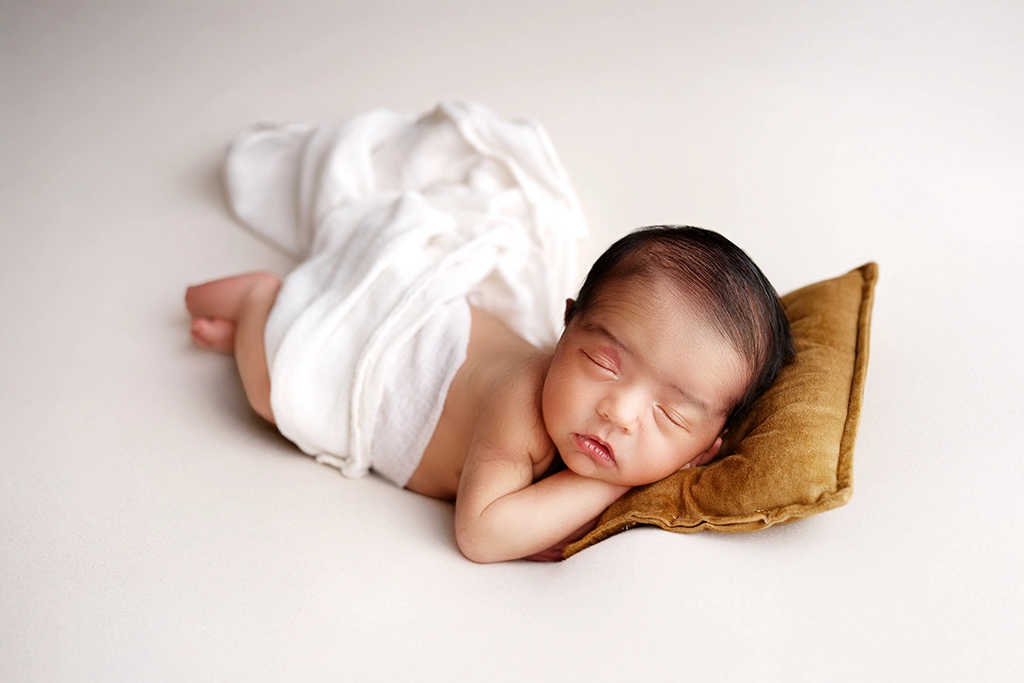 Newborn baby during a Watch Me Grow photography session in Enfield, North London
