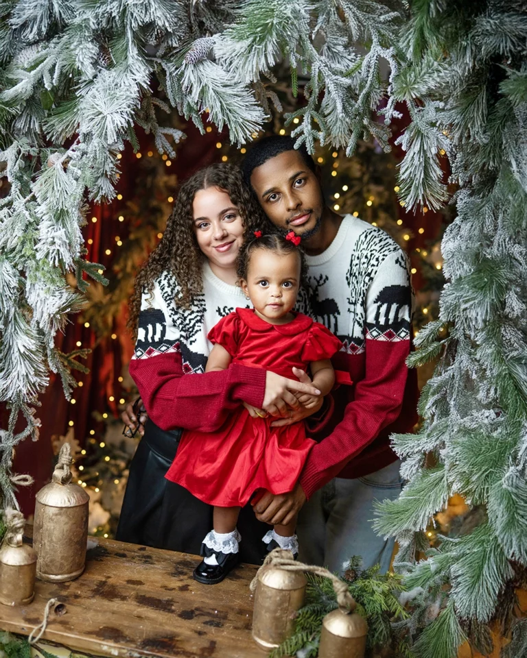 Family with young daughter during a Christmas photography session in Enfield, North London