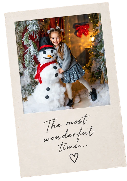 Christmas polaroid portrait of a young girl with a snowman in Enfield, North London