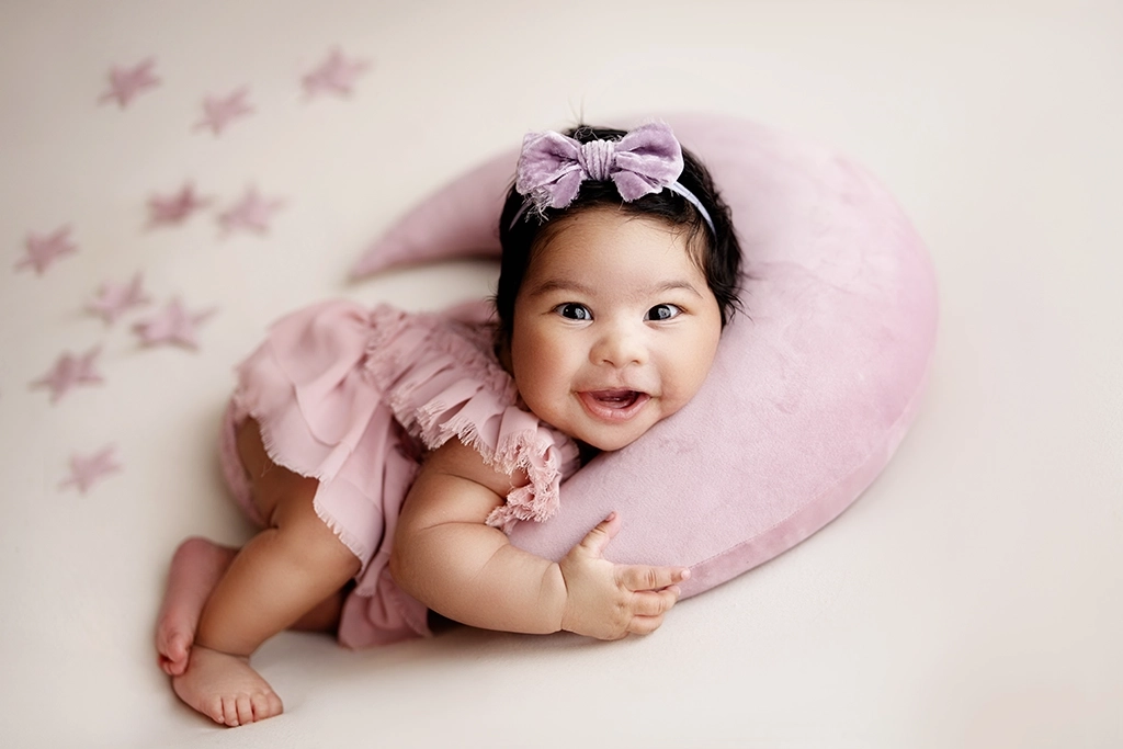 Older newborn baby photographed during a newborn photography session in an Enfield studio, North London